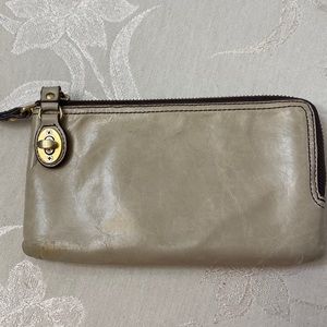HOBO Mila wristlet in “Linen”